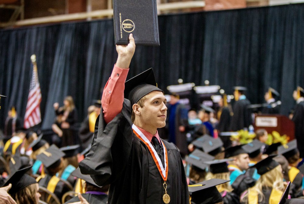UNO student celebrating graduation