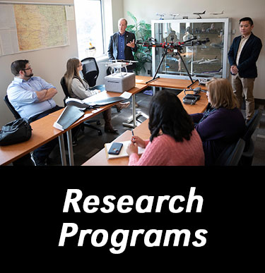 Text: Research Programs