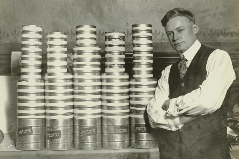 Harold Chenoweth with film canisters