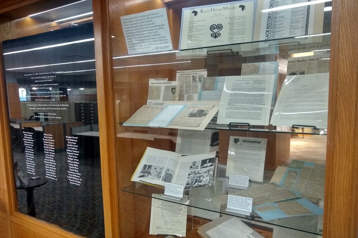 news clippings, documents, and text on display