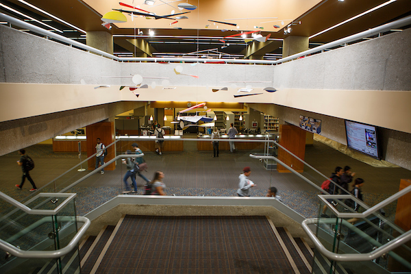 students walk around criss library