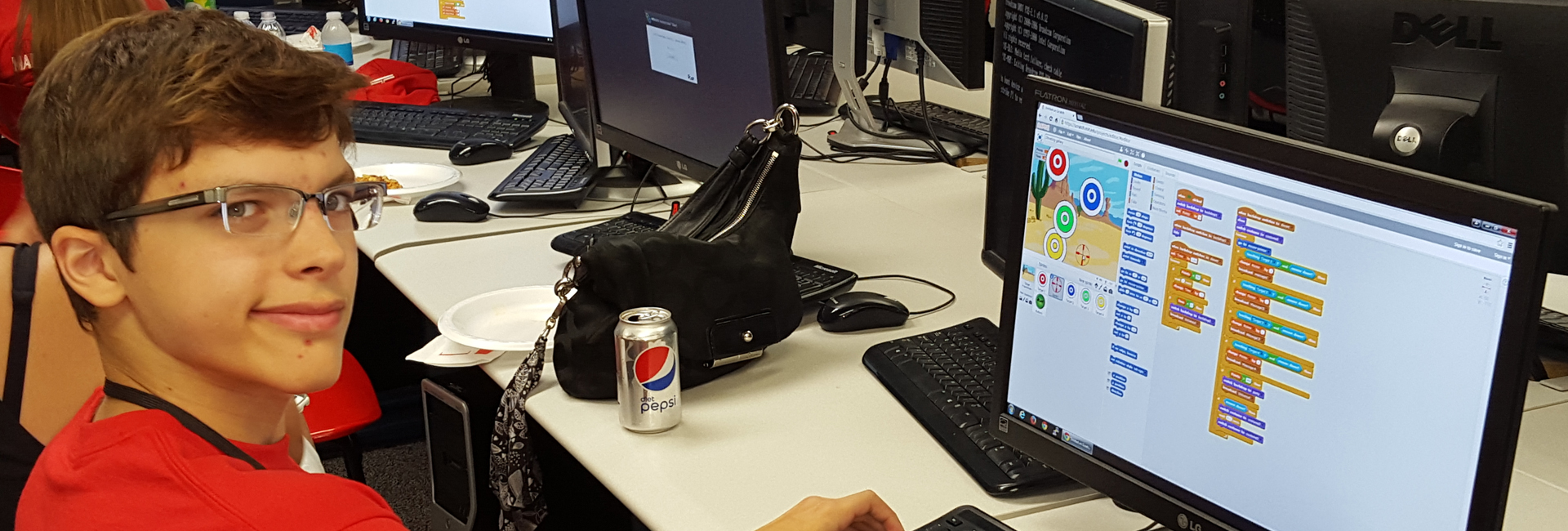 A Techademy student experiments with Scratch programming.