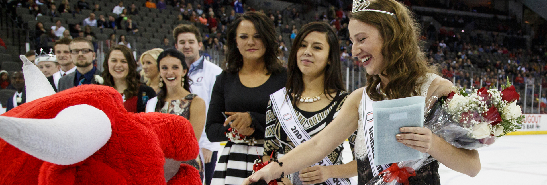 Down on one knee, Durango congratulates 2014 Homecoming Queen Morgan Birkel