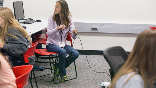 Students learn how to code a robot during a summer session of CodeCrush (June 2015).