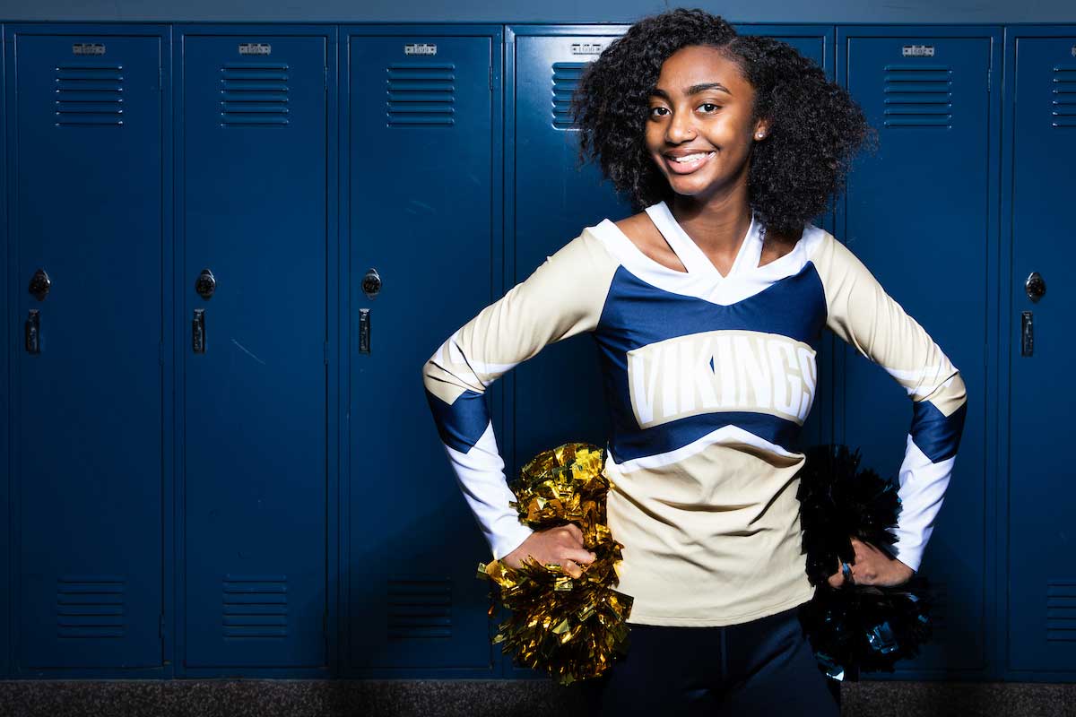 Desyree’ McGhee in front of her locker at  Omaha North High School.
