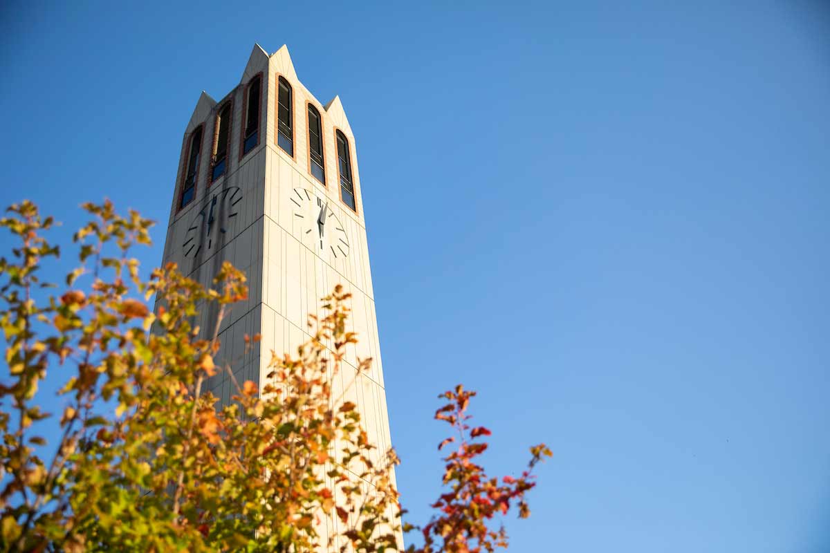 A photo of the Henningson Memorial Campanile in the fall