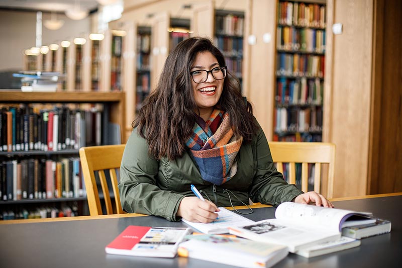 UNO student Melissa Ramos in library