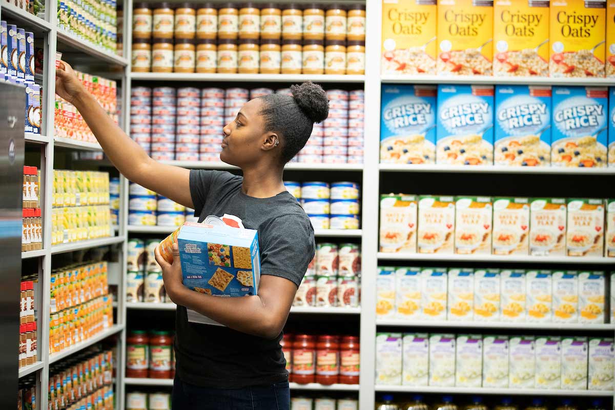 Student volunteering with a food bank