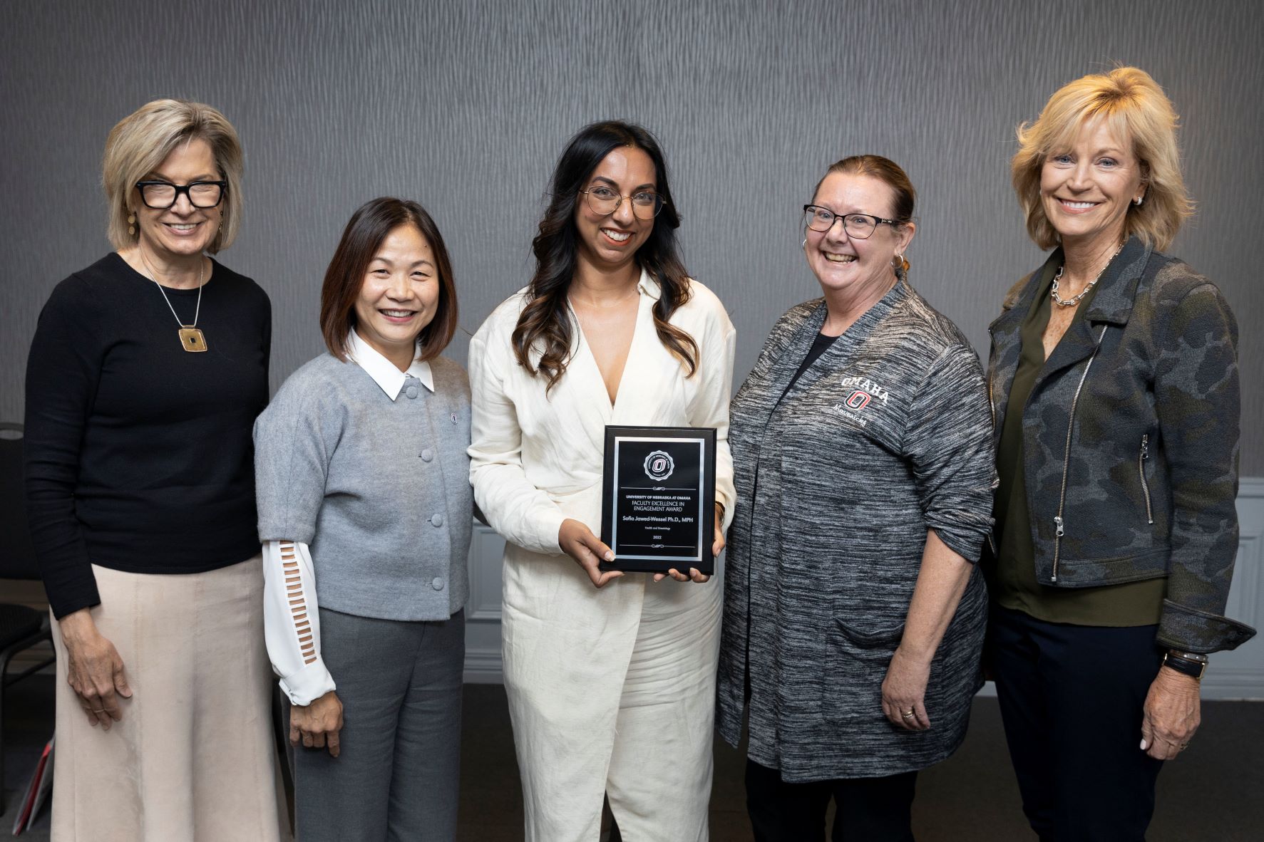 Chief Engagement Officer Sara Woods (left), Chancellor Joanne Li, Sofia Jawed-Wessel, Excellence in Engagement Award recipient, Interim Senior Vice Chancellor for Academic Affairs Deborah Smith-Howell, and Dean Nancy Edick.