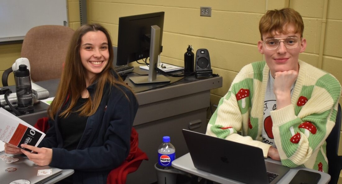 Two Honors students sitting together in a classroom.