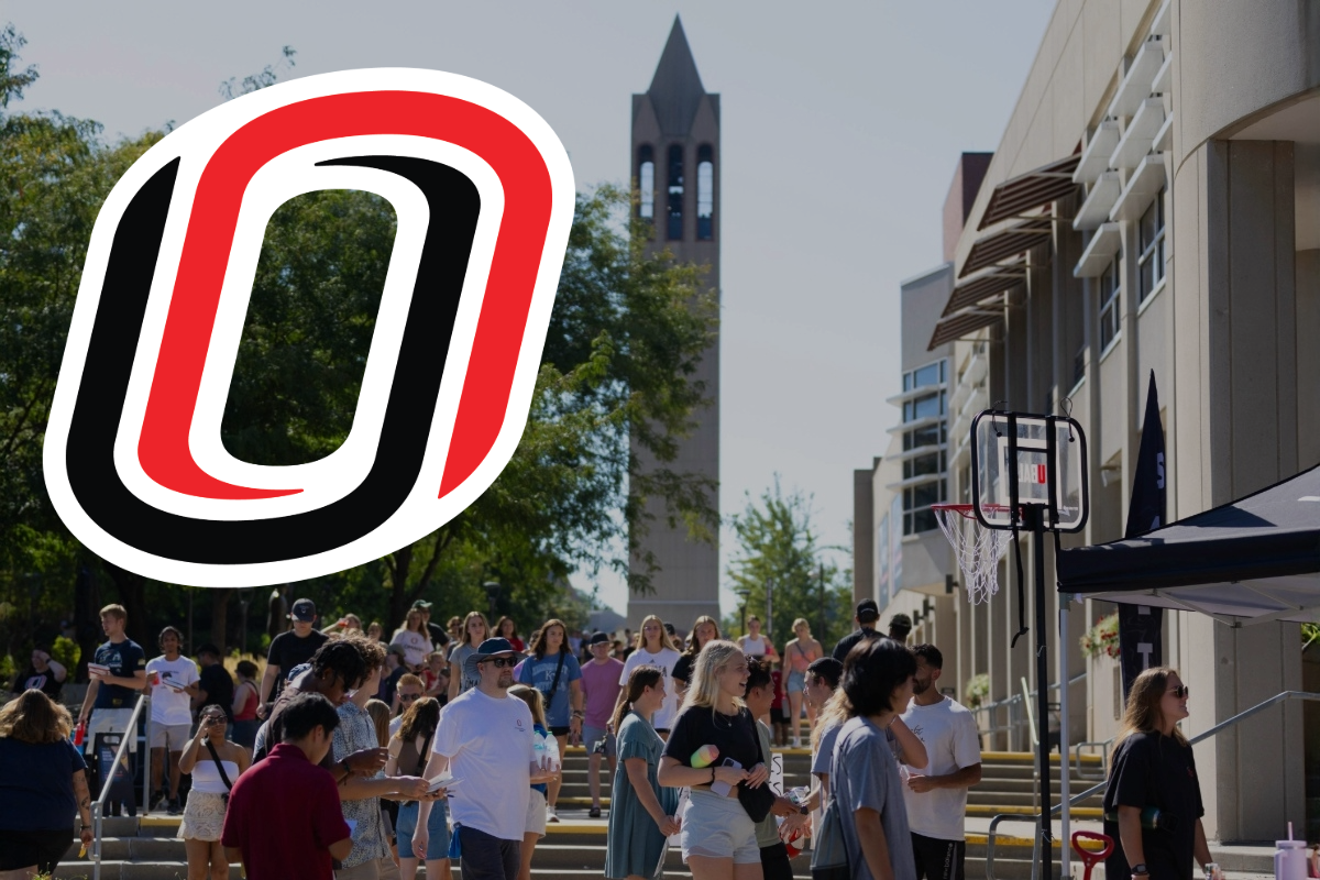 Students gather and socialize outside on the UNO campus during a sunny day, with the Henningson Memorial Campanile visible in the background. The UNO split 'O' logo is prominently displayed in the upper left corner of the image.