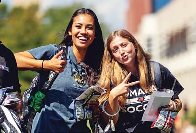 Two female students looking into the camera