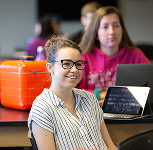 uno student in classroom