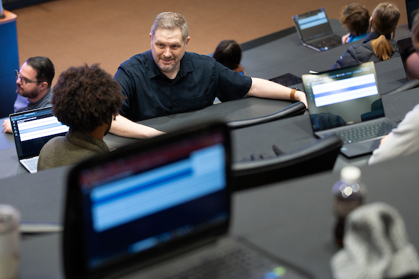 an instructor teaching a computer science class.