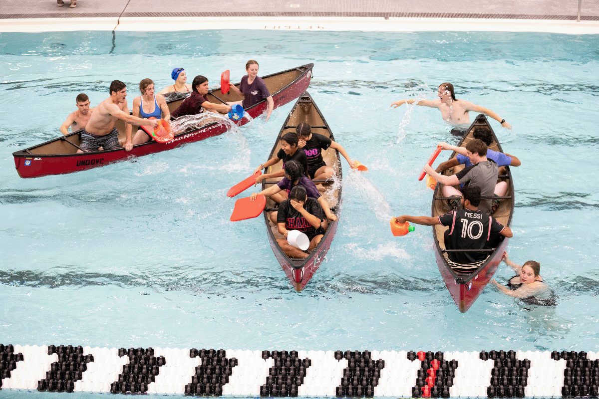 people in canoes in the H&K pool.
