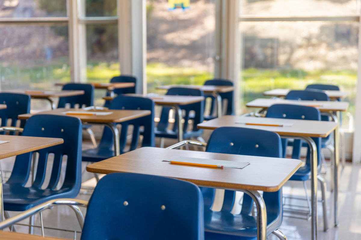 A classroom filled with student desks.