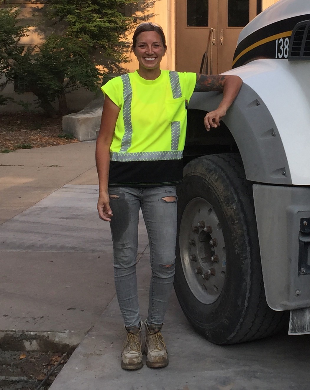 Photo of Linda Pawlenty with a truck