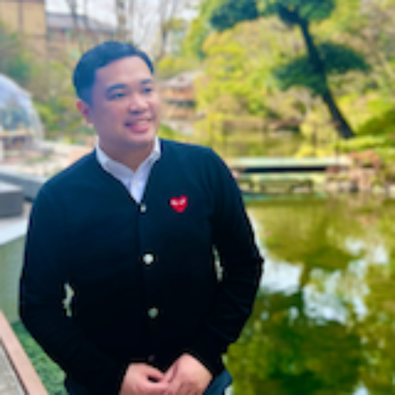 Ariane Macalinga Borlongan stands in a park. 