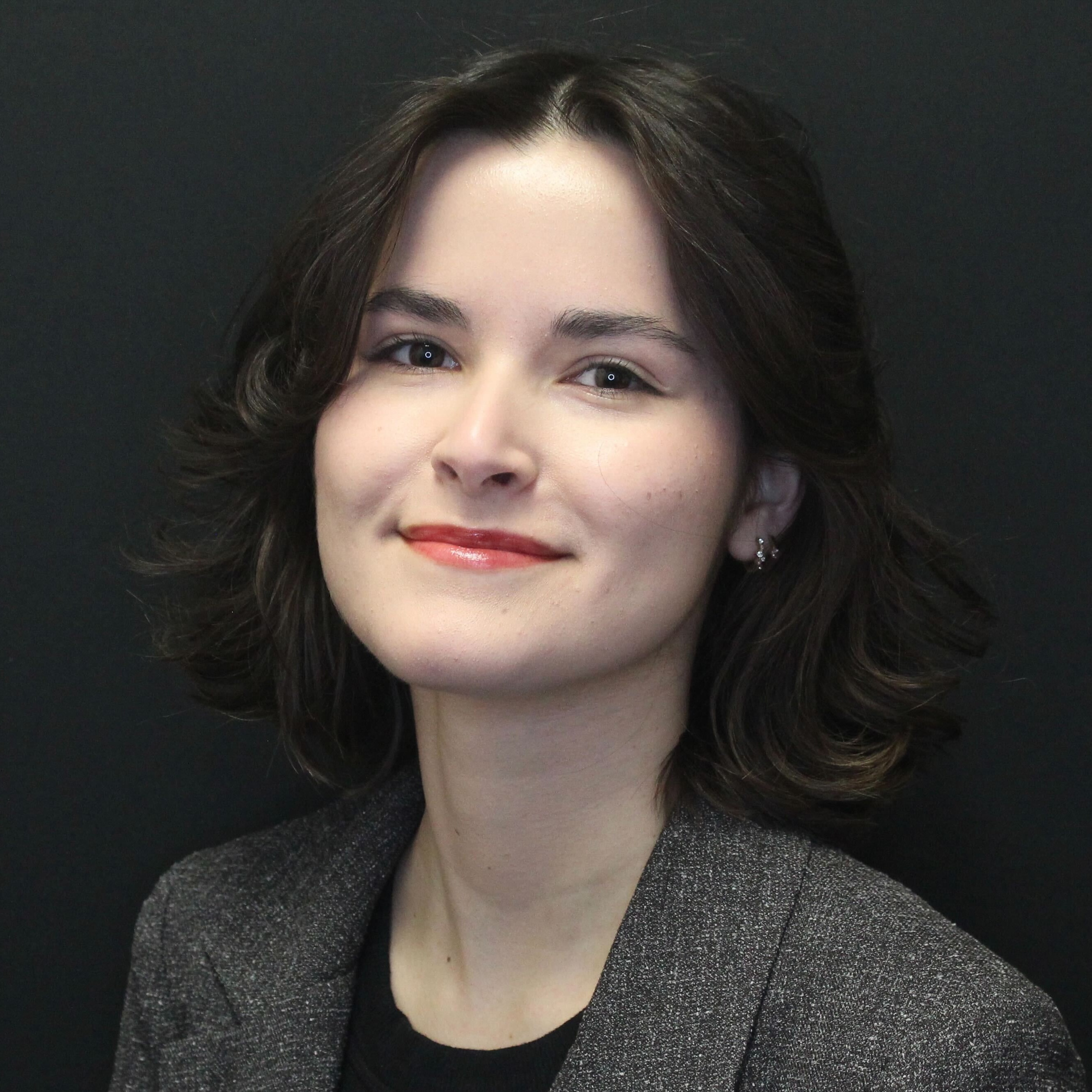 Julie Schrock portrait on black background