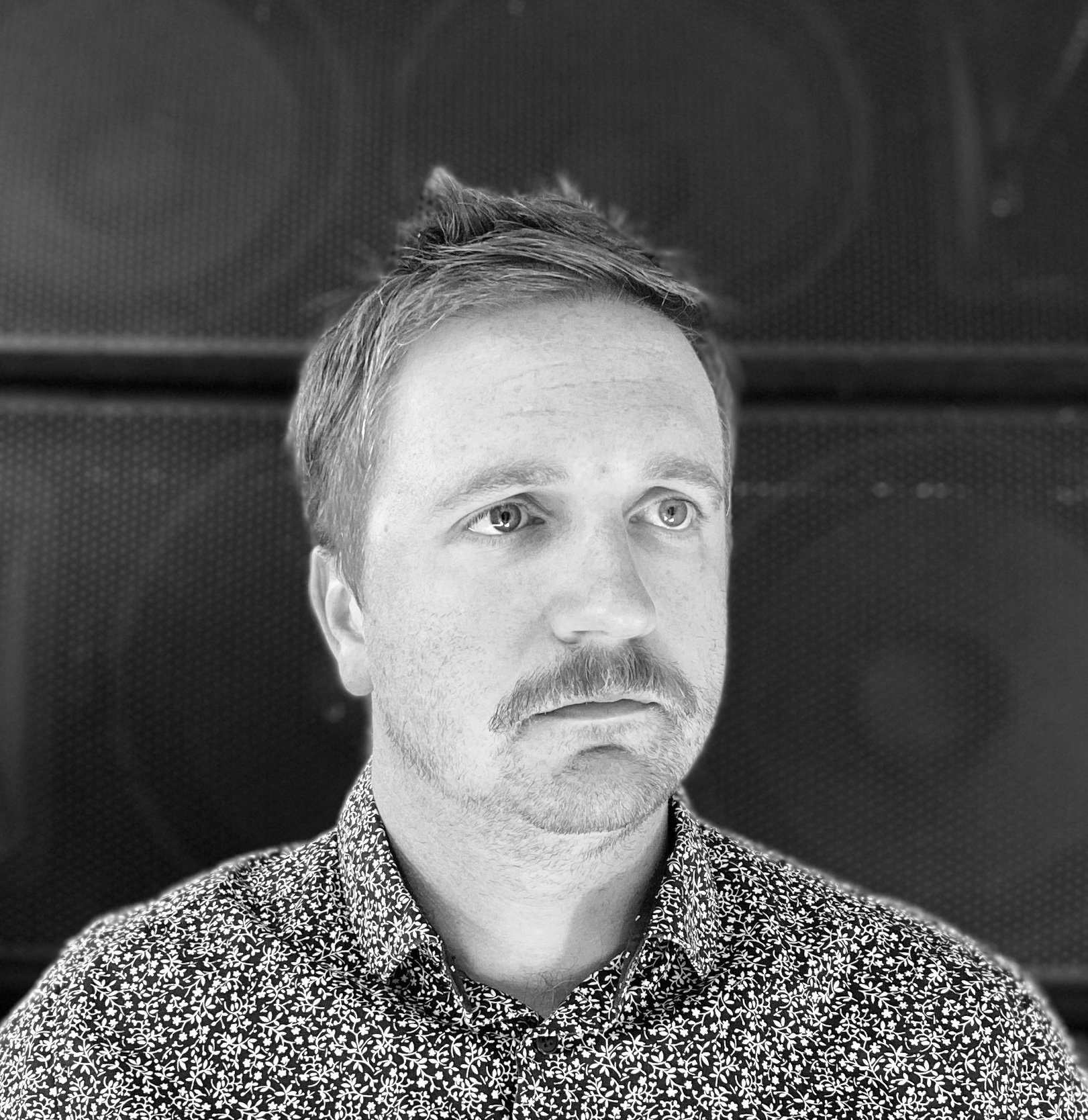 black and white headshot of Thomas Flaherty.