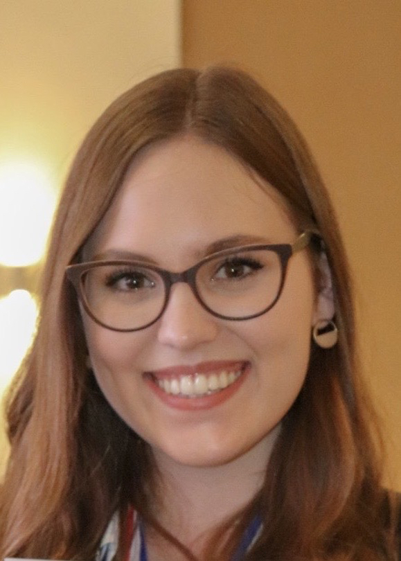 Sydney Meier smiles at the camera.