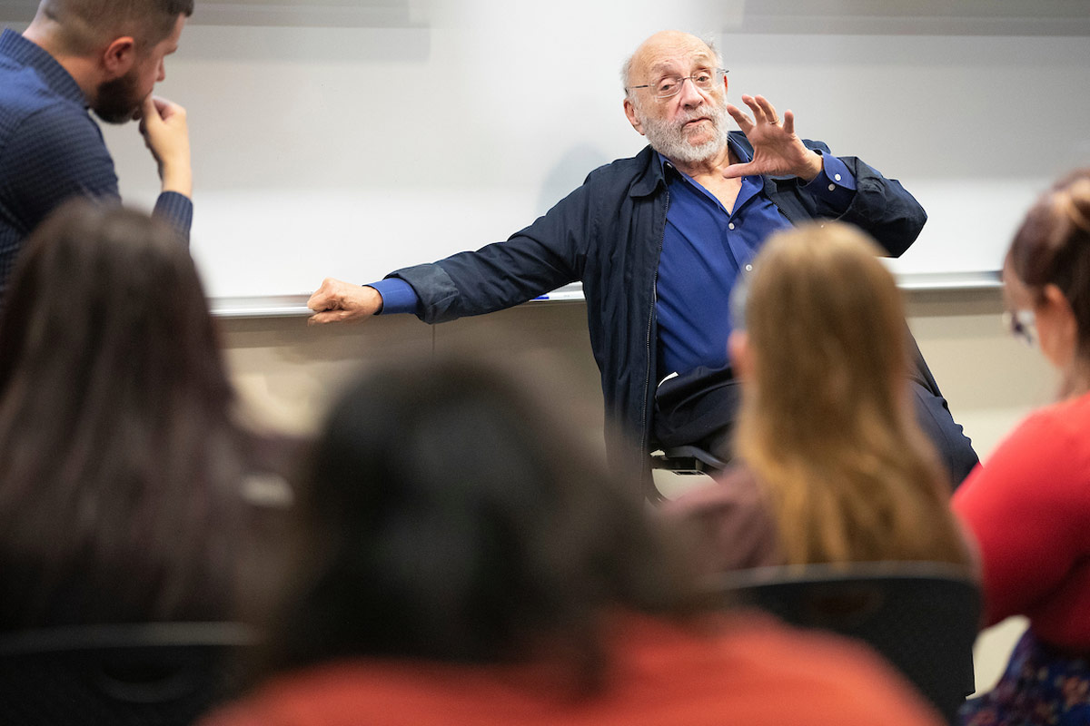 Renowned artist and Holocaust survivor Samuel Bak speaks to Mark Celinscak's class. 