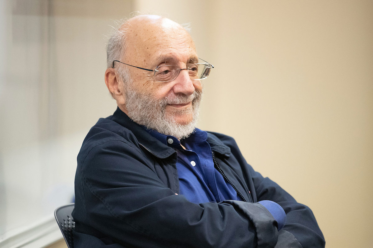 Artist Samuel Bak smiles during his visit to Mark Celinscak's class