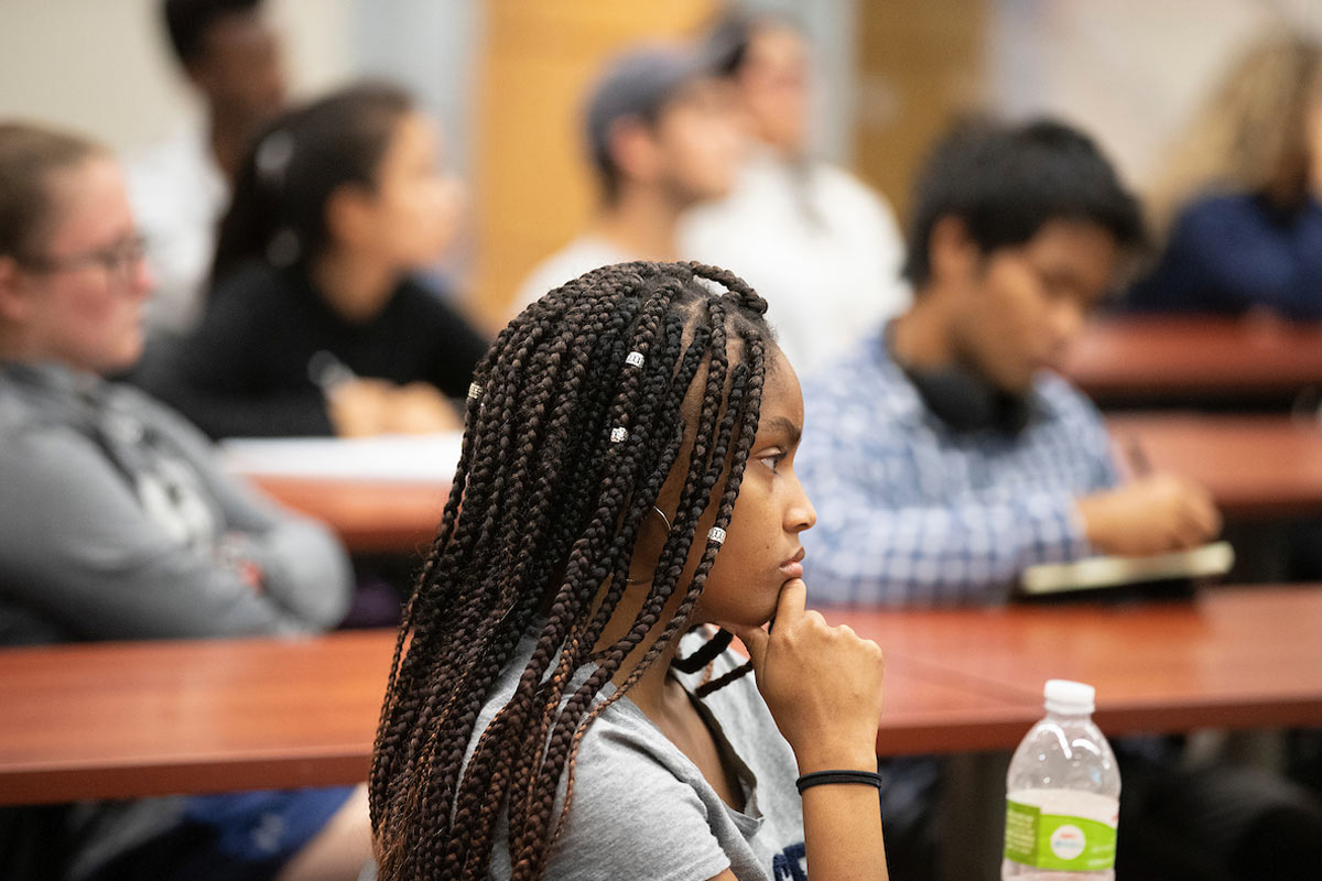 Students listening to Samuel Bak