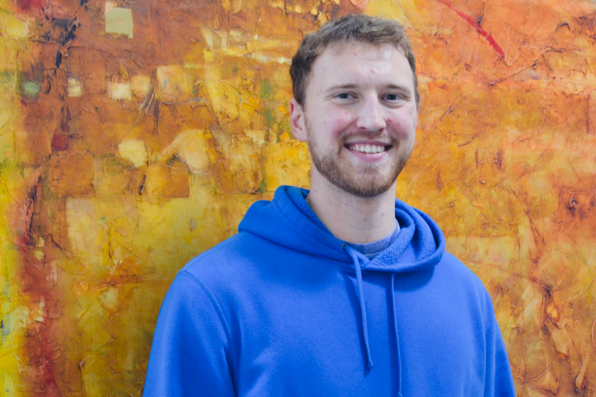 Tyler Baldwin wears a blue hoodie.