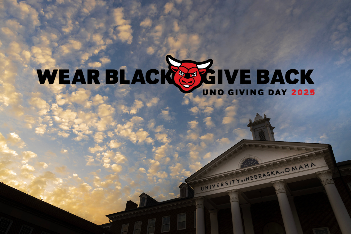 Arts and Sciences Hall with the words, Wear Black, Give Back written over it. 
