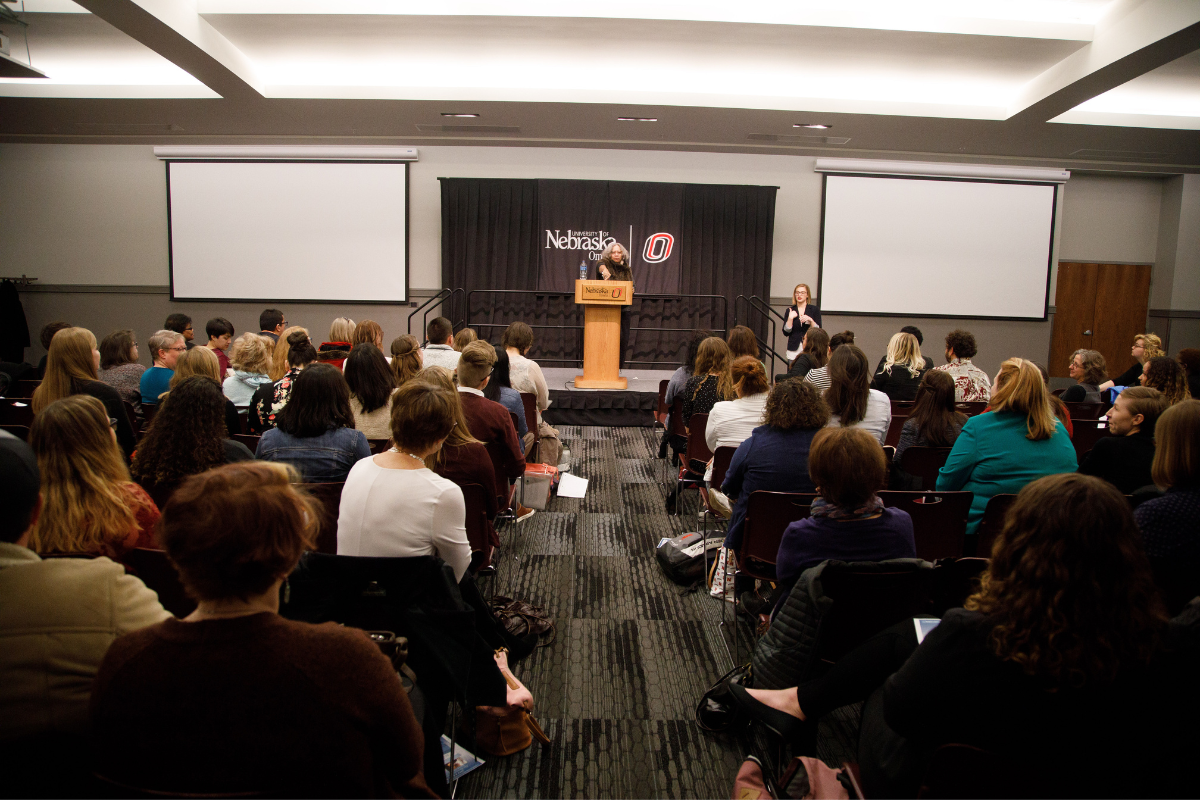 Attendees at No Limits! listen to a speaker. 