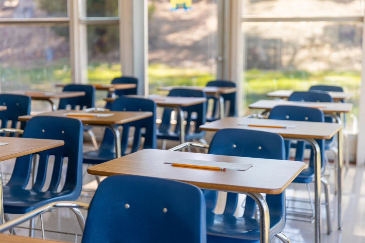 A classroom with empty chairs.