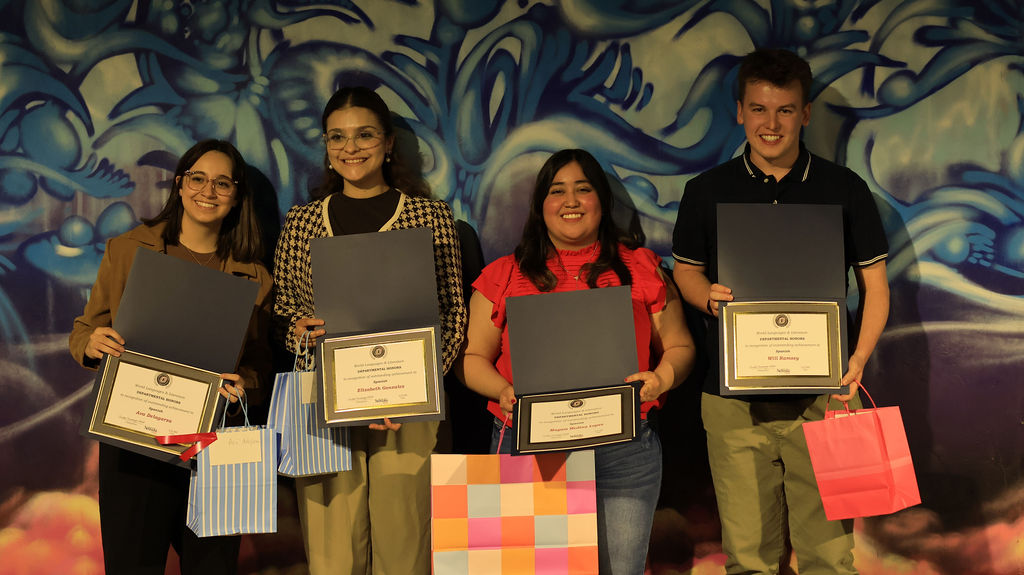 Departmental Honors Students Holding their certificates