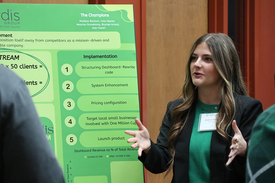 Student presenting poster