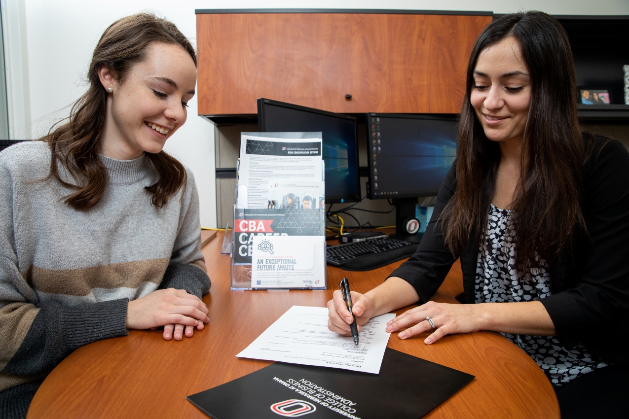 student talking with advisor