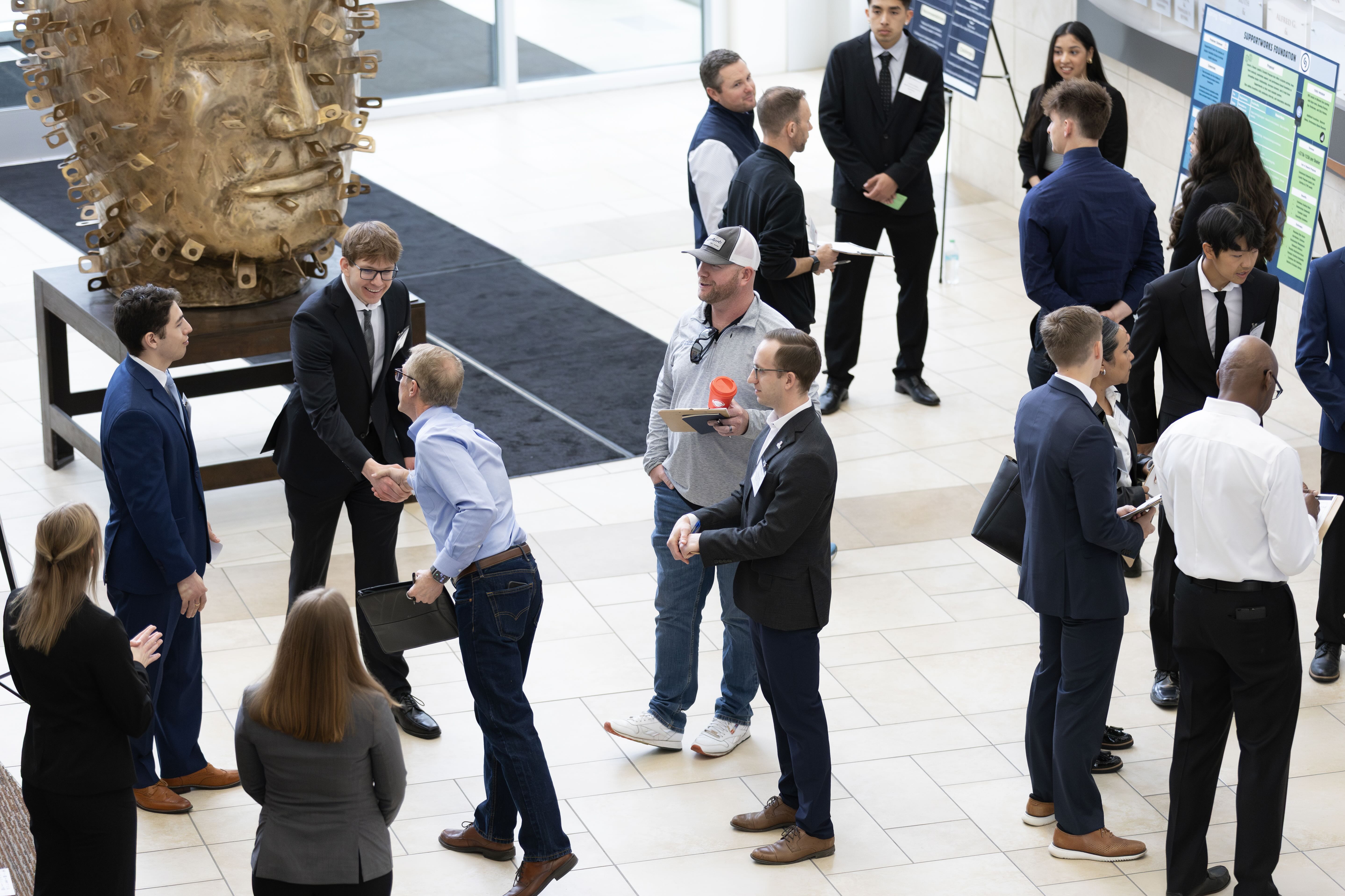 Students shaking hands with judges