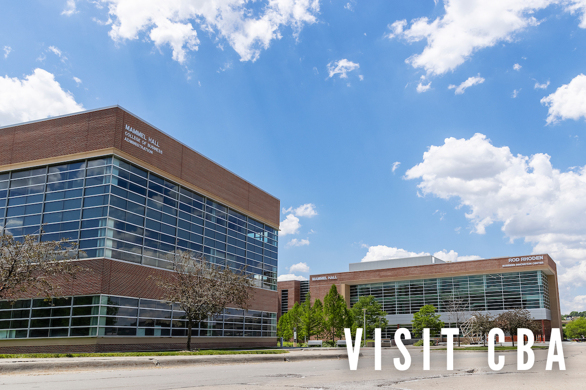 An image of a large building with glass windows.