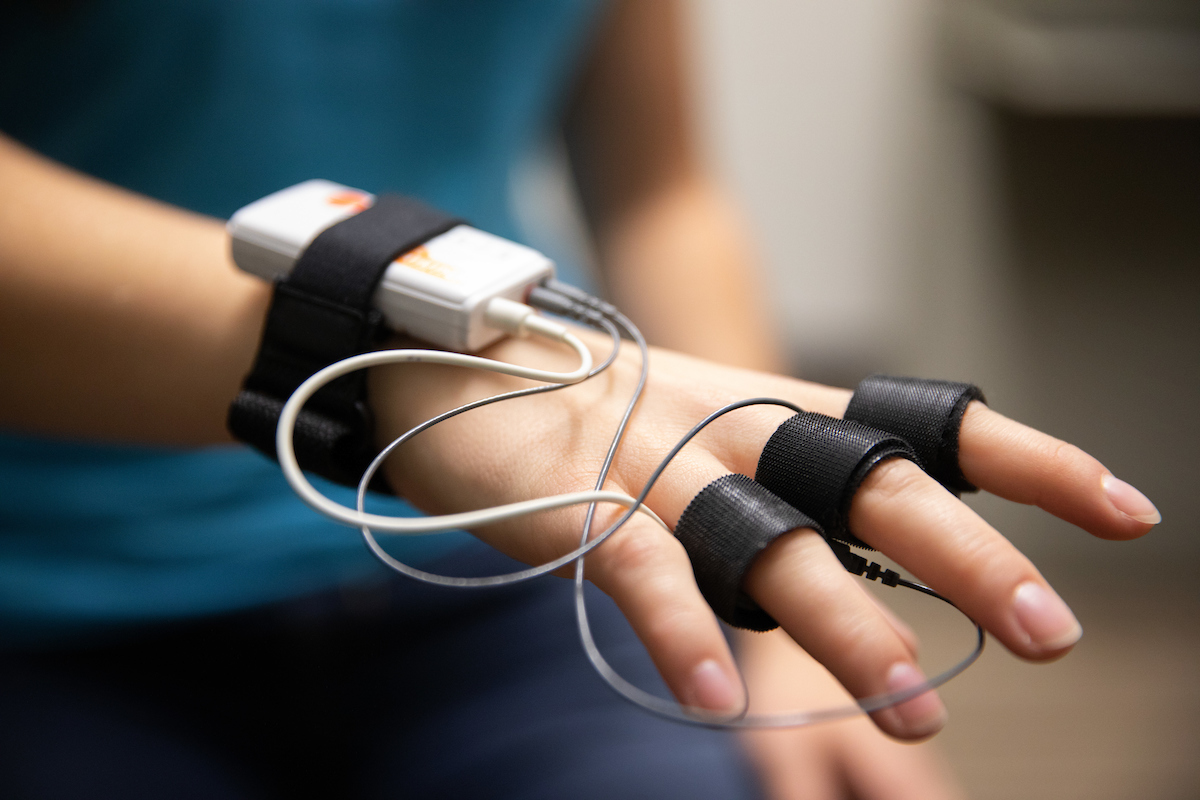 A hand with a GSR device attatched to it.