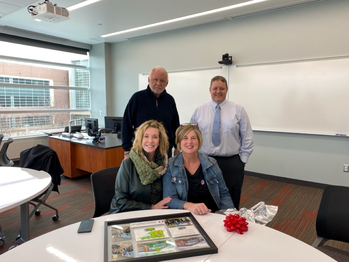 The Koraleski CAB Lab, Dean Michelle Trawick, and Assistant Dean David Nielsen give a gift to Mr. Rod Rhoden and Ms. Sharon McDermott. 