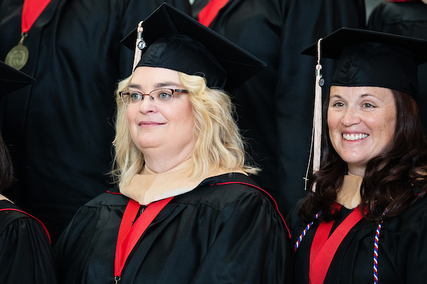 EMBA students participated in a graduation ceremony at the University of Nebraska Omaha's Mammel Hall