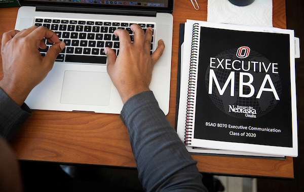 Student studying in the EMBA program