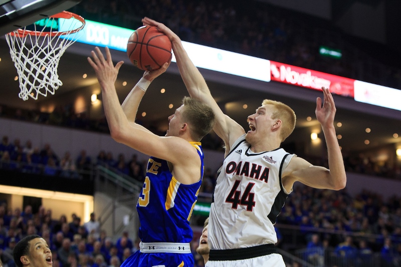 Mitch Hahn dunks a basket.