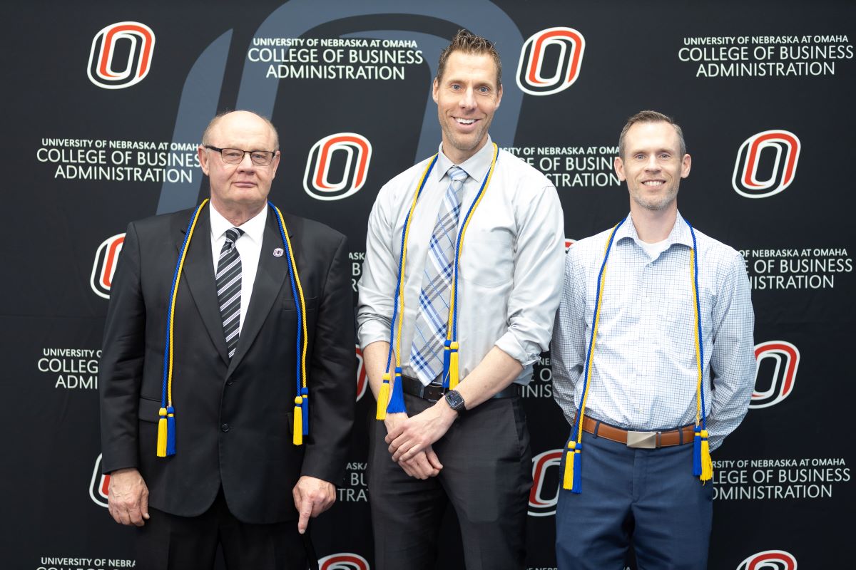 An image of faculty standing together