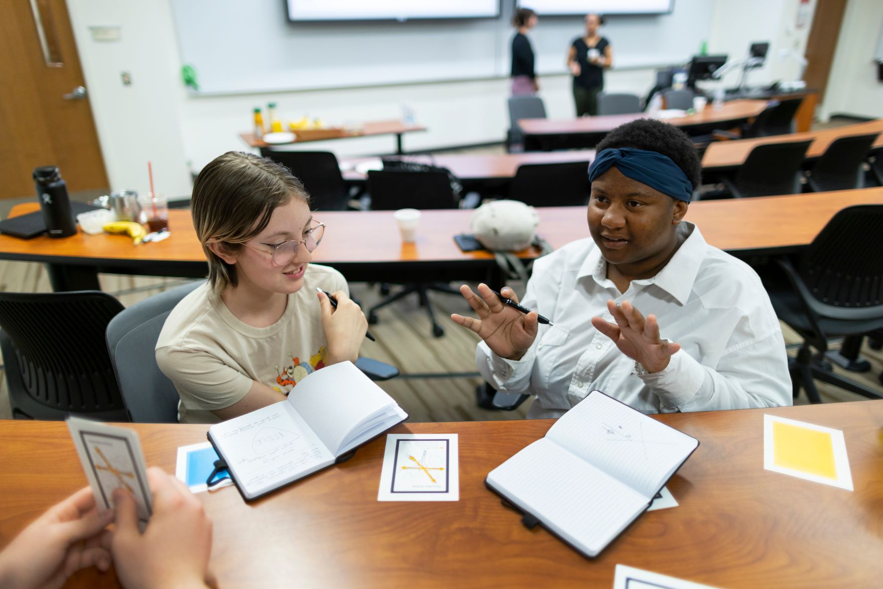 Two students work together on a project