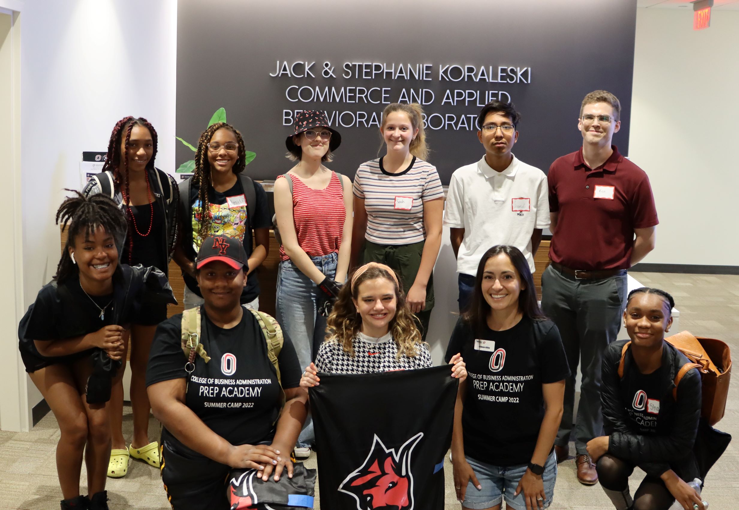 An image of a group of students smiling.