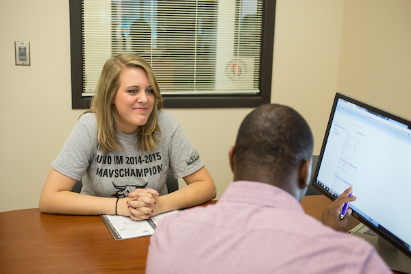 student talking with advisor