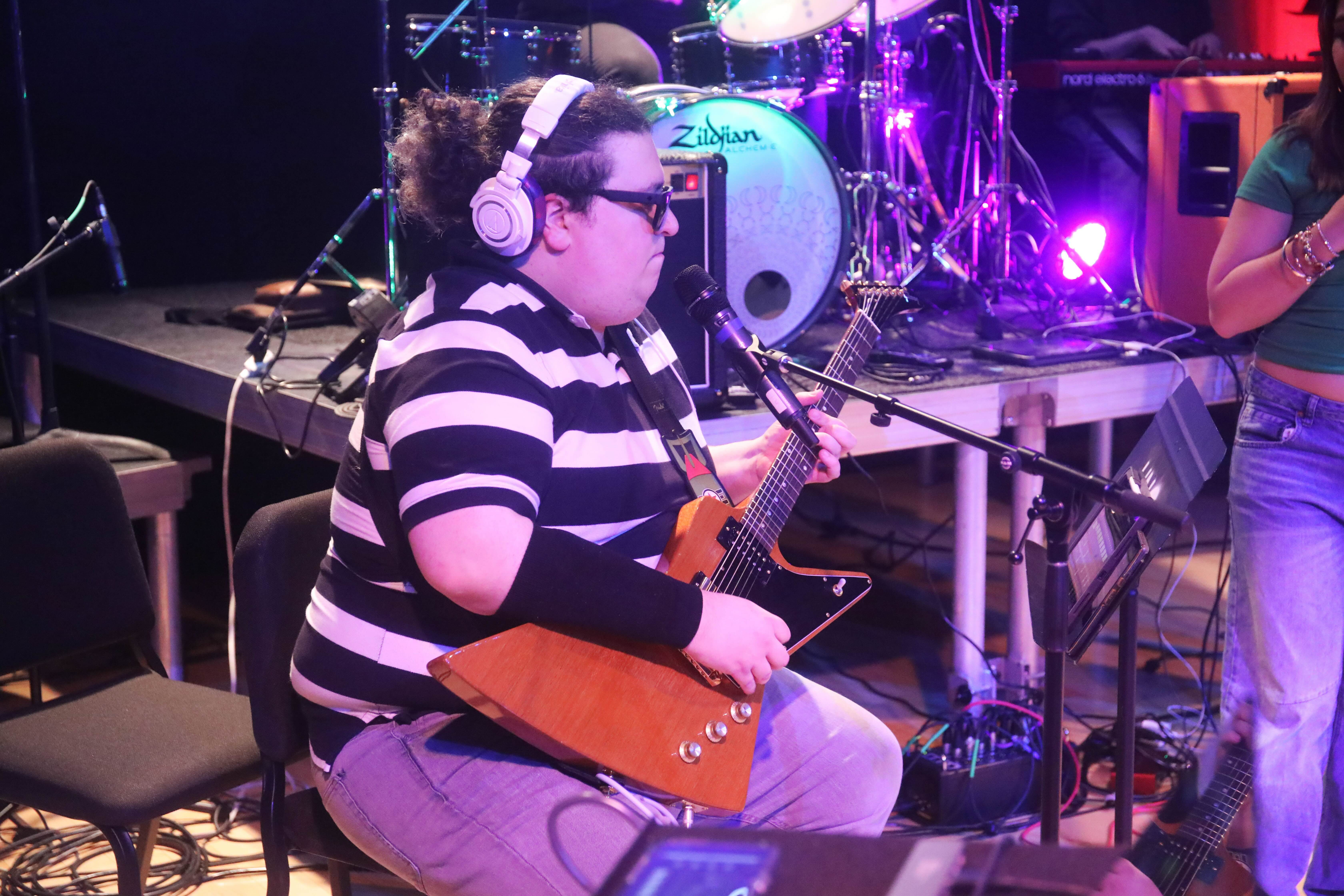 Student Playing Guitar 