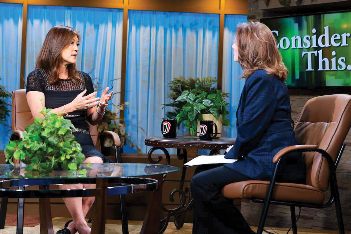 Juju Chang being interviewed by UNO TV’s “Consider This” host Cathy Wyatt