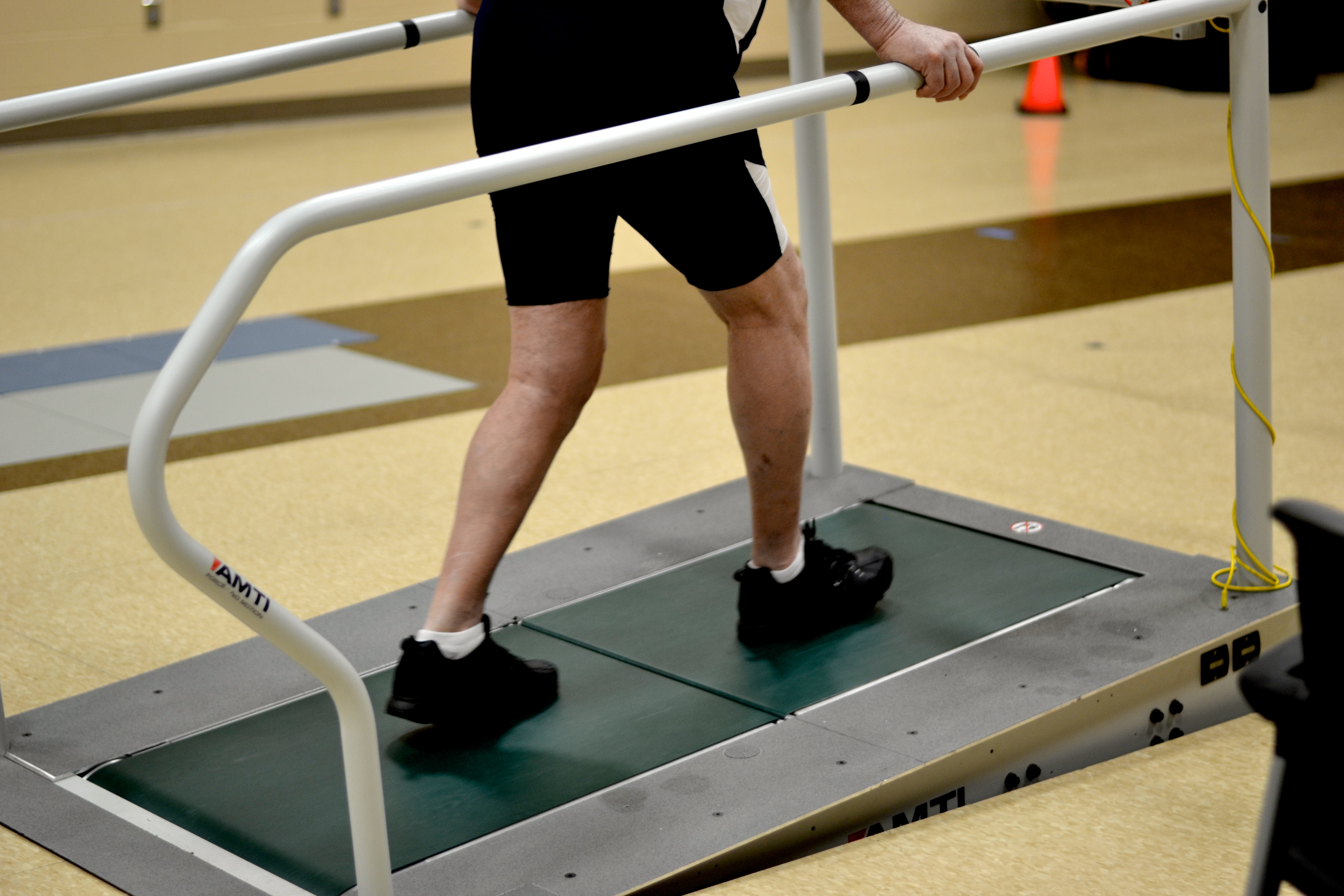 man walking on treadmill 