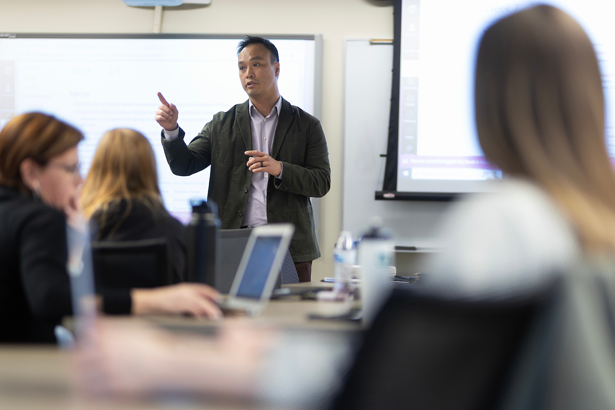 Dr. Thang Tran teaches a school counseling class to UNO students